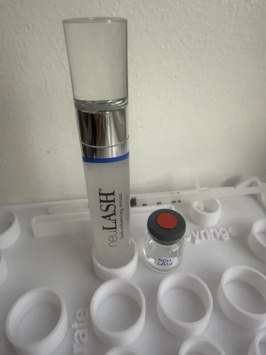 NeuLash tube beside its labeled test sample for The Lash List comparison