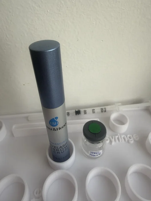 Terez & Honor tube beside its labeled test sample for The Lash List comparison